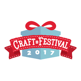 Blue gift box with a red bow and ribbon, labeled “CRAFT FESTIVAL 2017” in a red and white banner.